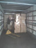 Rudy loading SAMEDAY Courie truck 